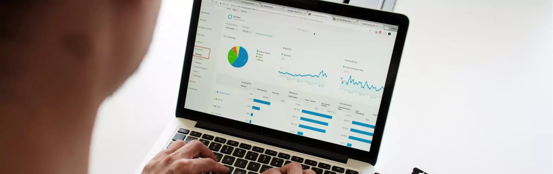 Business analytics data showing on laptop screen