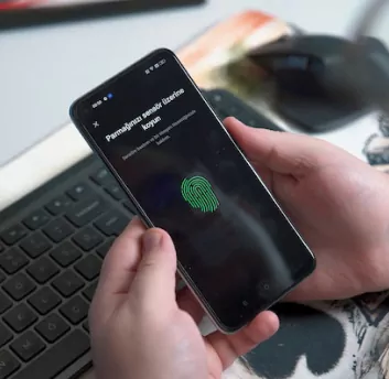 Mobile screen showing fingerprint security lock