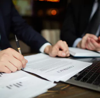 A lawyer signing some legal document